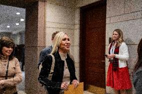 Representative Marjorie Taylor Greene walks out  after  the  classified briefing
