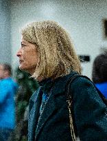 United States Senator  Lisa Murkowski walks out  after  the  classified briefing