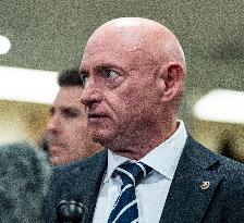 Mark Kelly offers remarks after he came out of a classified briefing