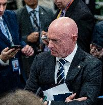 Mark Kelly offers remarks after he came out of a classified briefing