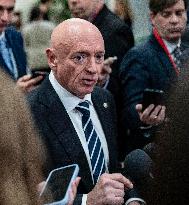 Mark Kelly offers remarks after he came out of a classified briefing