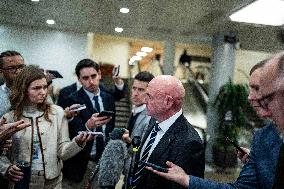 Mark Kelly offers remarks after he came out of a classified briefing