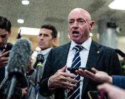 Mark Kelly offers remarks after he came out of a classified briefing