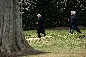 Trump Aides Walk On White House South Lawn - DC