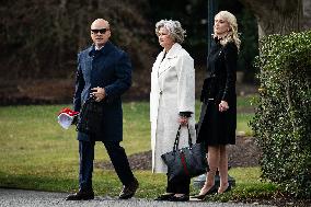 Trump Aides Walk On White House South Lawn - DC