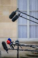 IIlustration - Microphones During a Presser