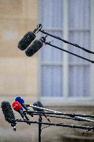 IIlustration - Microphones During a Presser