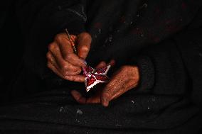 Production of Paper Mache Christmas Ornaments - India