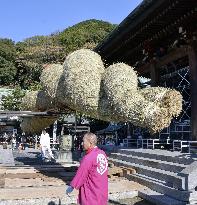 Giant "shimenawa" straw rope replacement at shrine