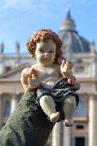 Baby Jesus Figurines During The Angelus Prayer - Vatican
