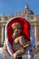 Baby Jesus Figurines During The Angelus Prayer - Vatican