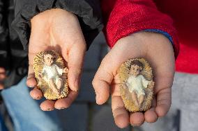 Baby Jesus Figurines During The Angelus Prayer - Vatican