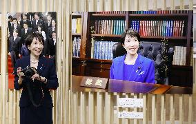 Japan PM Takaichi visits news photo exhibition