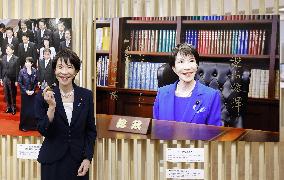 Japan PM Takaichi visits news photo exhibition