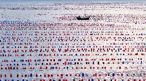 Farmers Harvest Oysters in Qingdao