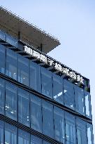 Kaga Electronics signboard and logo