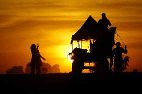 Tourists Enjoy a Camel Safari - India