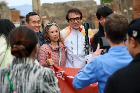 Jackie Chan Holds the Milan Cortina 2026 Olympic Flame - Pompeii