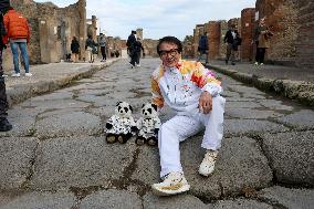 Jackie Chan Holds the Milan Cortina 2026 Olympic Flame - Pompeii