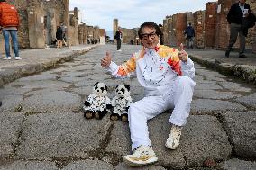 Jackie Chan Holds the Milan Cortina 2026 Olympic Flame - Pompeii