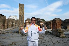 Jackie Chan Holds the Milan Cortina 2026 Olympic Flame - Pompeii
