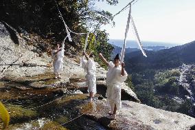 Year-end ritual at Nachi Falls