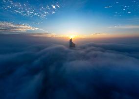 Building Shrouded By Fog And Cloud - Kuwait City
