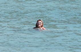 Heidi Klum, Tom Kaulitz and Bill Kaulitz in St Barths - France