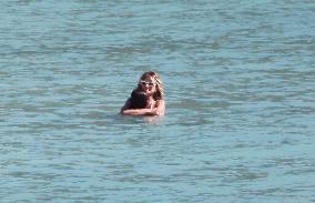 Heidi Klum, Tom Kaulitz and Bill Kaulitz in St Barths - France