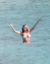 Heidi Klum, Tom Kaulitz and Bill Kaulitz in St Barths - France