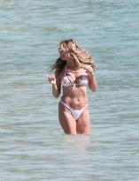 Heidi Klum, Tom Kaulitz and Bill Kaulitz in St Barths - France