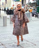 Rita Ora and Ryan Seacrest out in Times Square