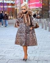 Rita Ora and Ryan Seacrest out in Times Square