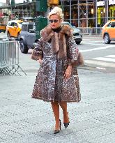 Rita Ora and Ryan Seacrest out in Times Square