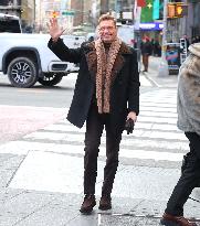 Rita Ora and Ryan Seacrest out in Times Square