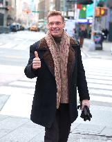 Rita Ora and Ryan Seacrest out in Times Square