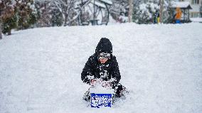 Children and Families Enjoy Snowfall in Gaziantep