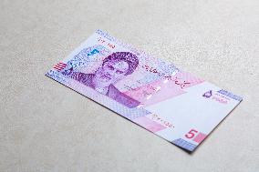 Illustration - Iranian Rial vs US Dollar A Currency in Crisis