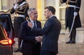 Macron Welcomes Carney At Elysee Palace - Paris