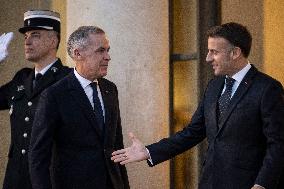 Macron Welcomes Carney At Elysee Palace - Paris