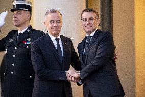 Macron Welcomes Carney At Elysee Palace - Paris