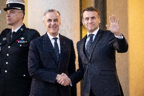 Macron Welcomes Carney At Elysee Palace - Paris