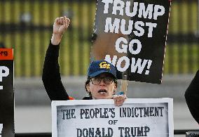 Protesters gather to denounce raids conducted by the US Immigration and Customs Enforcement (ICE)