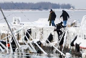 Preparing a vessel to be raised from underwater