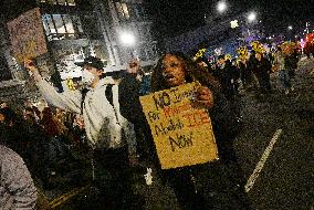 Protesters demonstrate against raids conducted by the US Immigration and Customs Enforcement (ICE)  OD