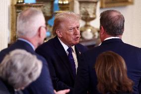 US President Donald Trump mets with oil executives in the East Room