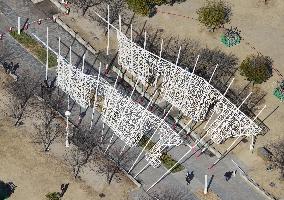 Artwork collapses before illumination event in Kobe