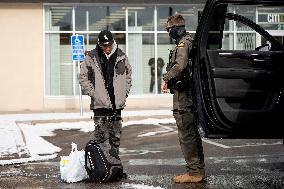 Federal Agents Check A Person's Identification - Minneapolis