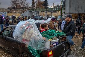 Civilians Flee Aleppo Amid Kurdish-Government Clashes