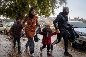Civilians Flee Aleppo Amid Kurdish-Government Clashes